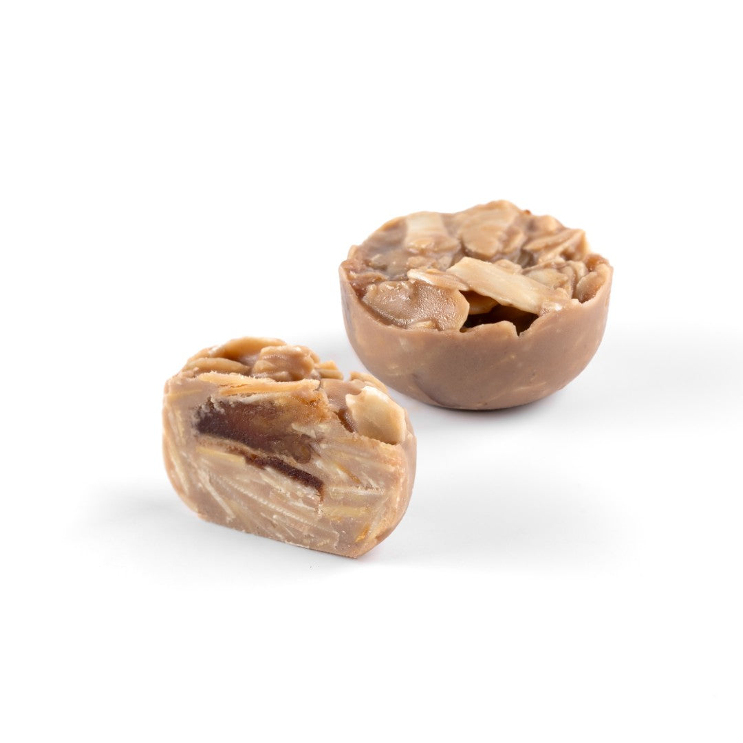 Kholas Dates With Almond Nut Filling Covered In Golden Chocolate Slivers