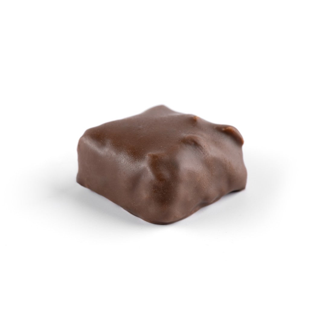 Kholas Dates With Roasted Hazelnut Filling Covered In Milk Chocolate