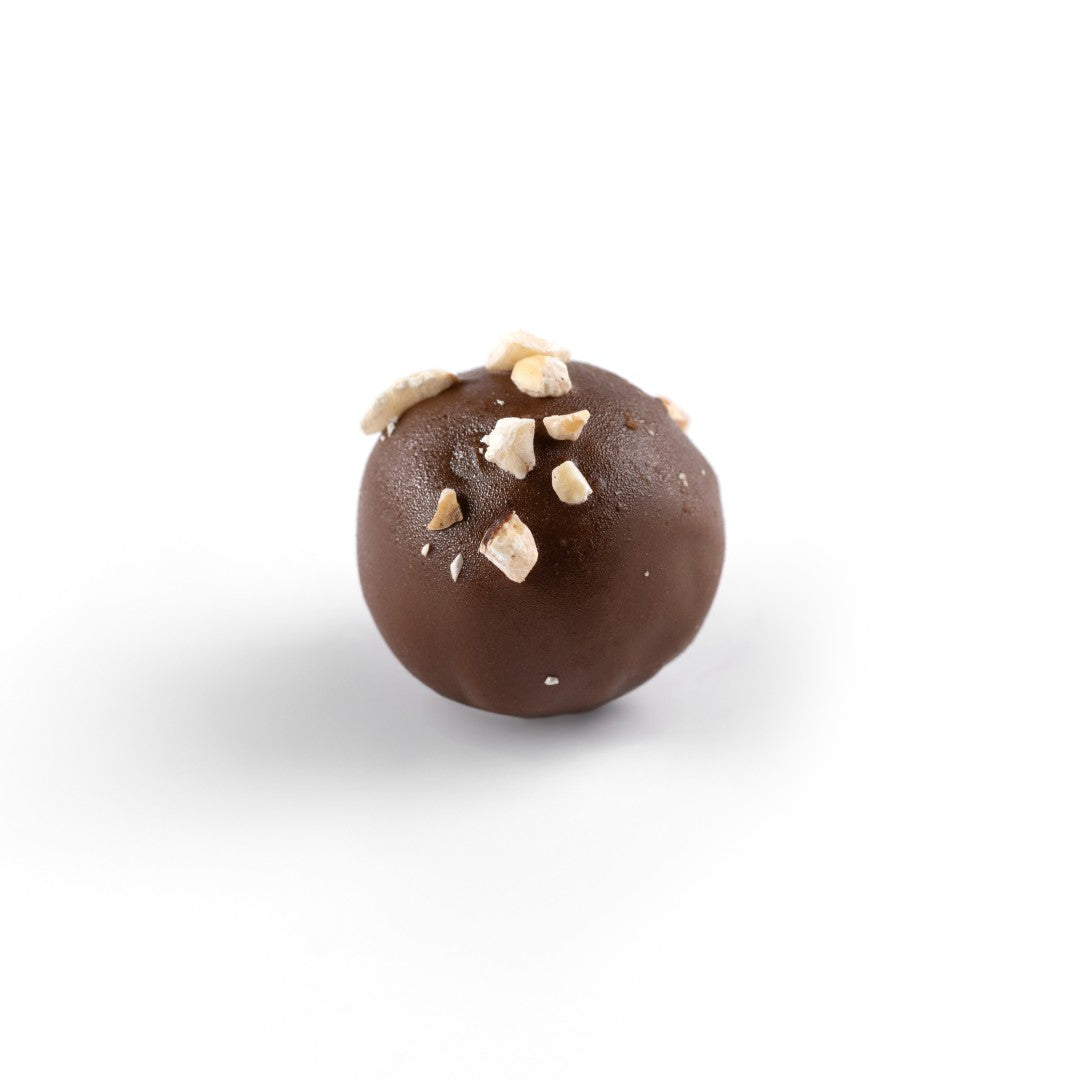 Milk Chocolate-Covered Kholas Date With Caramelized Hazelnut